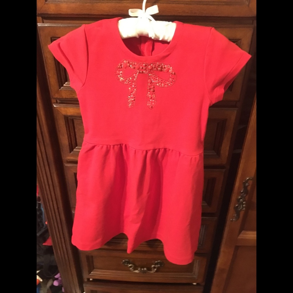 Red pointe knit dress with sparkly bow